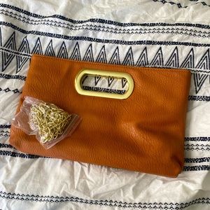 Charming Charlie’s Tan/Orange Clutch